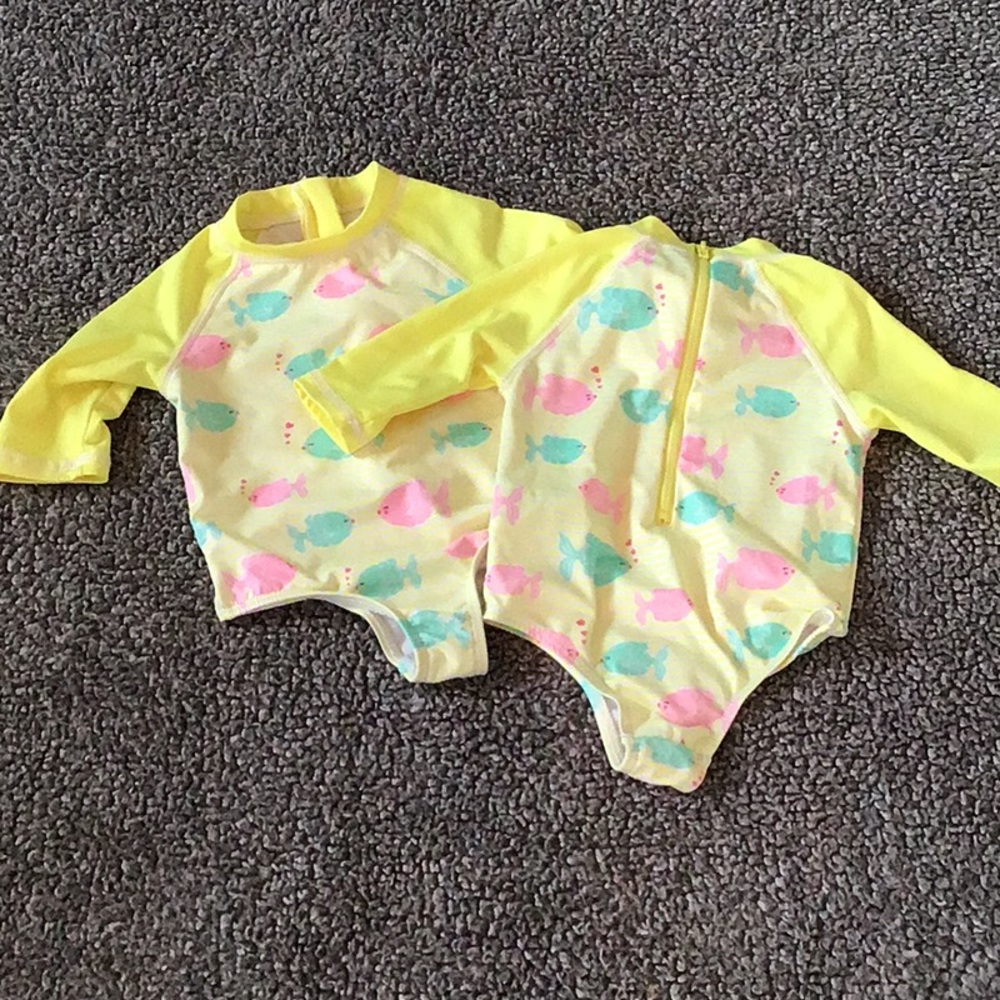Two matching rash guard swim suits
